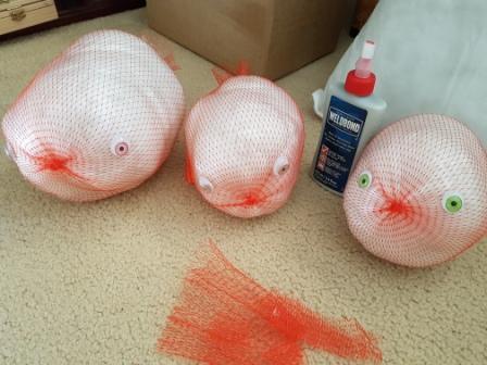 Craft project: Stuffed puffer fish waiting for their eyes to dry. Next step, glue on the fins.!
